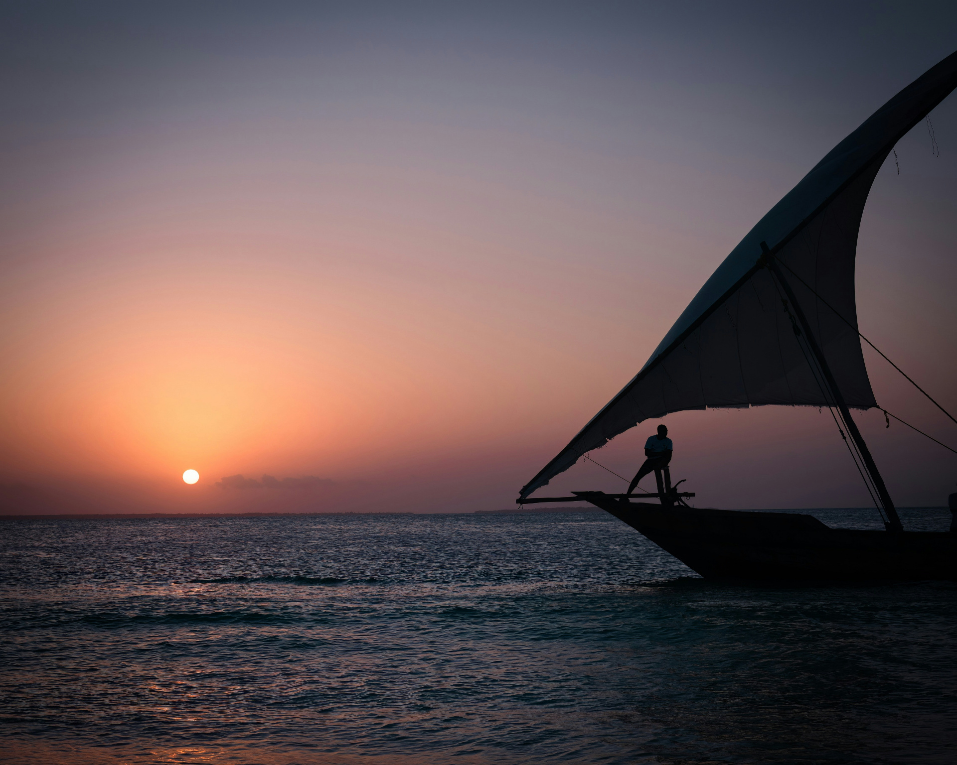 Traditional dhow sailing off the coast of Zanzibar